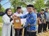 Bupati Muna Barat Serahkan Perpanjangan SK BPD hingga 2028, Ingatkan BPD Jadi Lembaga Kontrol Desa