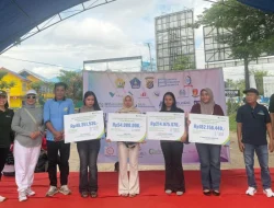 Ahli Waris Pekerja Terima Santunan BPJS Ketenagakerjaan saat Peringatan Hari Buruh 2026 di Kendari